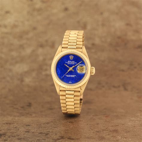 Rolex. A fine lady's 18K gold automatic calendar bracelet